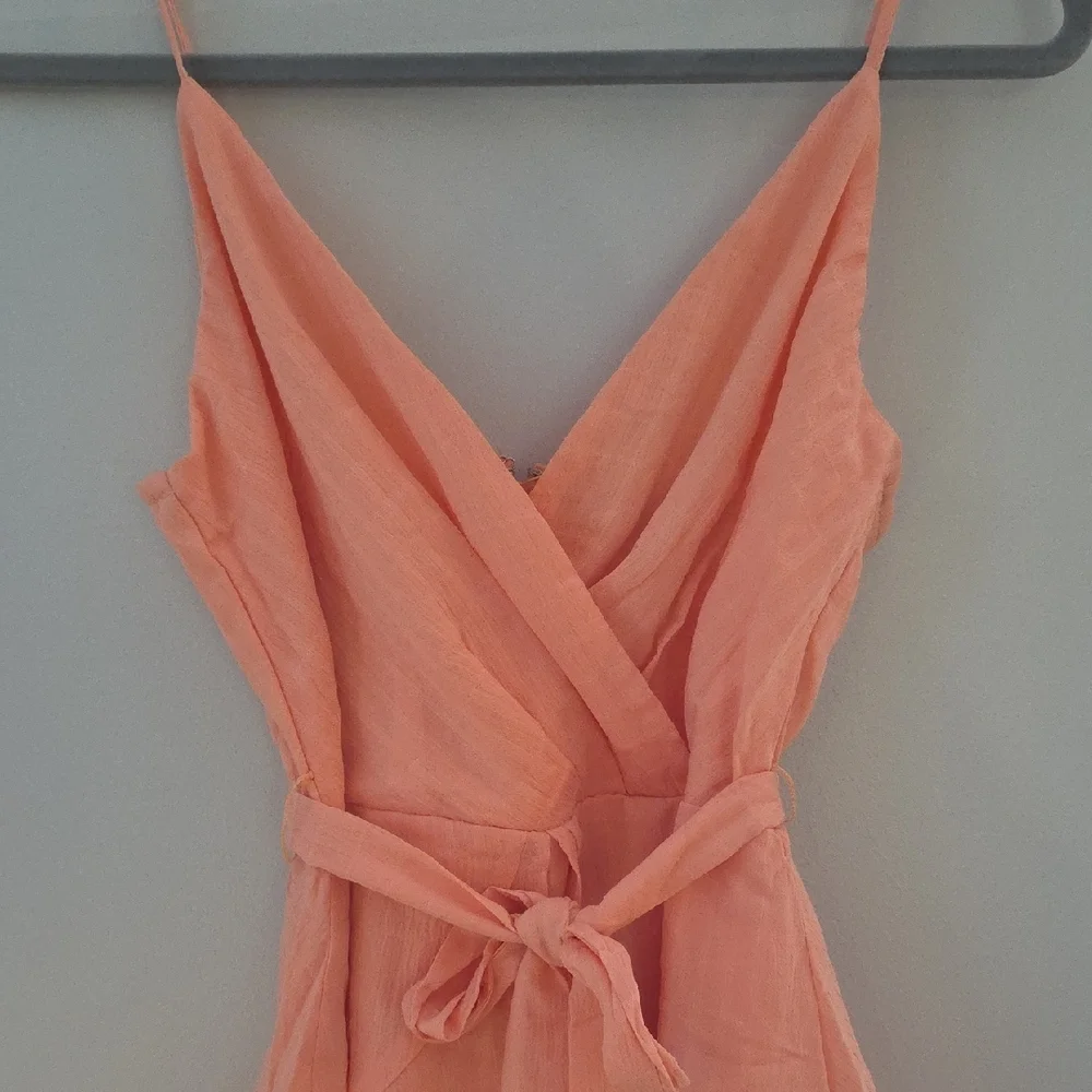 Coral Wrap Romper with Ruffle Skirt - Picture 3 of 4